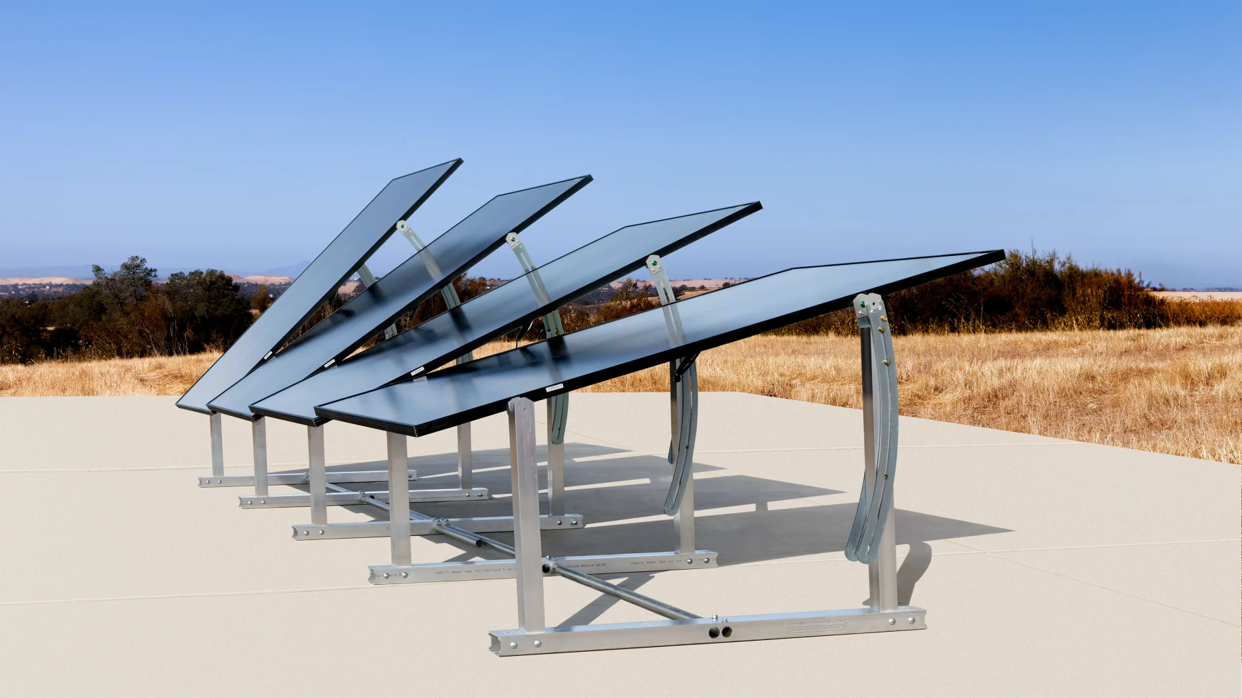 Row of solar panels on IntegraRack IR-45ASA adjustable ground mount frames