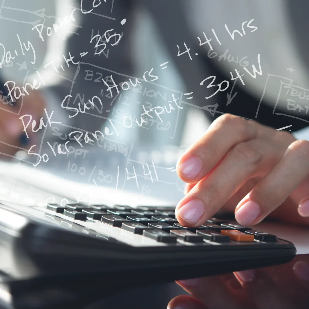 Close photo of someone using a calculator. Faint equations overlay the image.